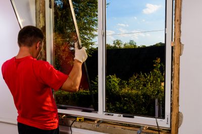Storm window installation on a home